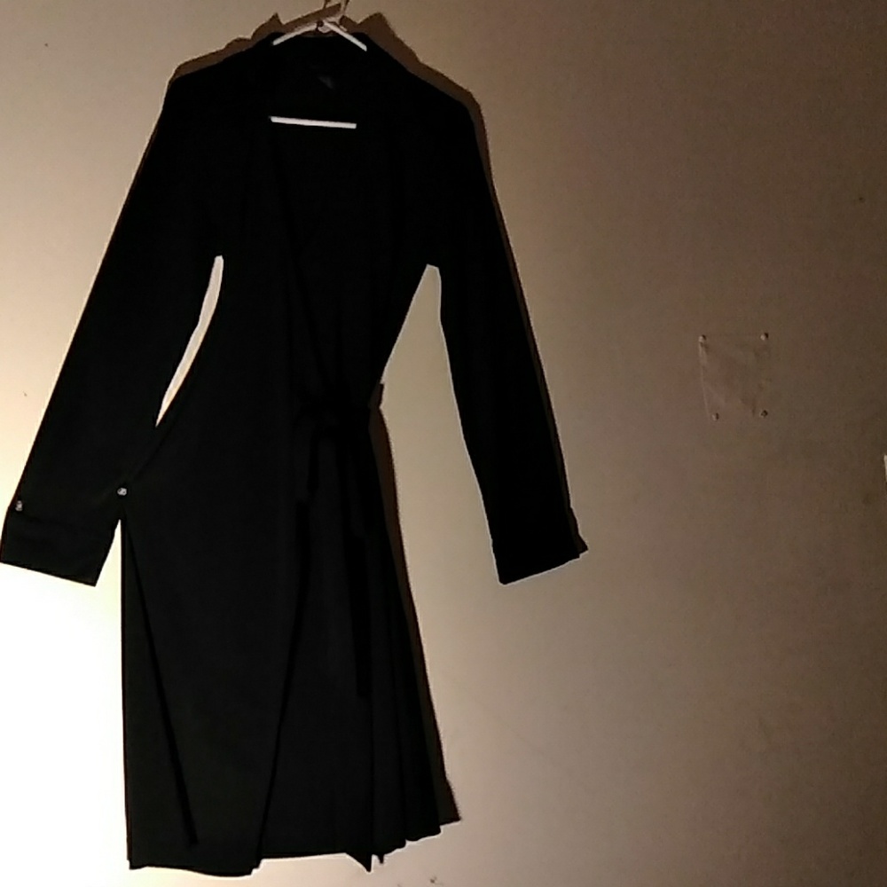 Wrap around dress with long tie.